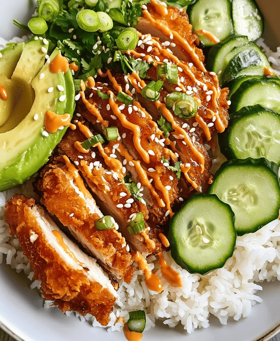 The Bang Bang Chicken Bowl is a delicious and visually stunning dish that has recently captured the hearts of food enthusiasts everywhere. Combining crispy fried chicken, vibrant fresh vegetables, and a creamy, spicy sauce, this bowl meal offers a delightful mix of textures and flavors. The crispy chicken provides a satisfying crunch, while the fresh vegetables bring a refreshing contrast, creating an appealing and well-rounded meal.