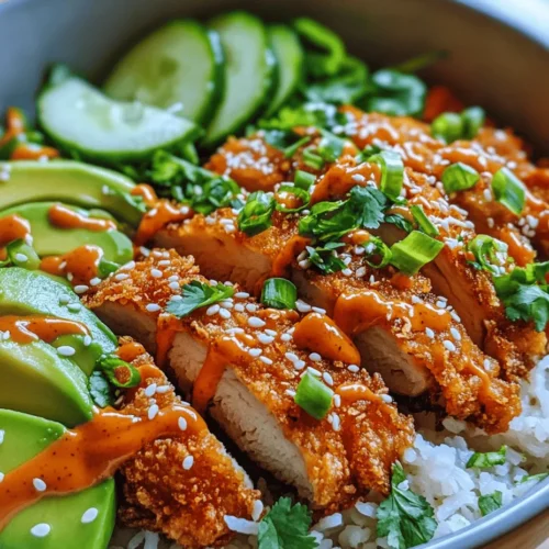 The Bang Bang Chicken Bowl is a delicious and visually stunning dish that has recently captured the hearts of food enthusiasts everywhere. Combining crispy fried chicken, vibrant fresh vegetables, and a creamy, spicy sauce, this bowl meal offers a delightful mix of textures and flavors. The crispy chicken provides a satisfying crunch, while the fresh vegetables bring a refreshing contrast, creating an appealing and well-rounded meal.