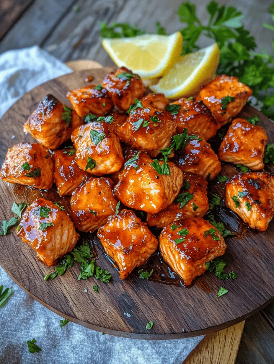 If you're searching for a delicious, easy-to-make dish that perfectly balances sweet, spicy, and savory flavors, look no further than Hot Honey Salmon Bites. This innovative recipe combines the rich taste of fresh salmon with the contrasting elements of honey's sweetness and the heat of Sriracha. The result is a delightful culinary adventure that tantalizes your taste buds while being simple enough for anyone to whip up.