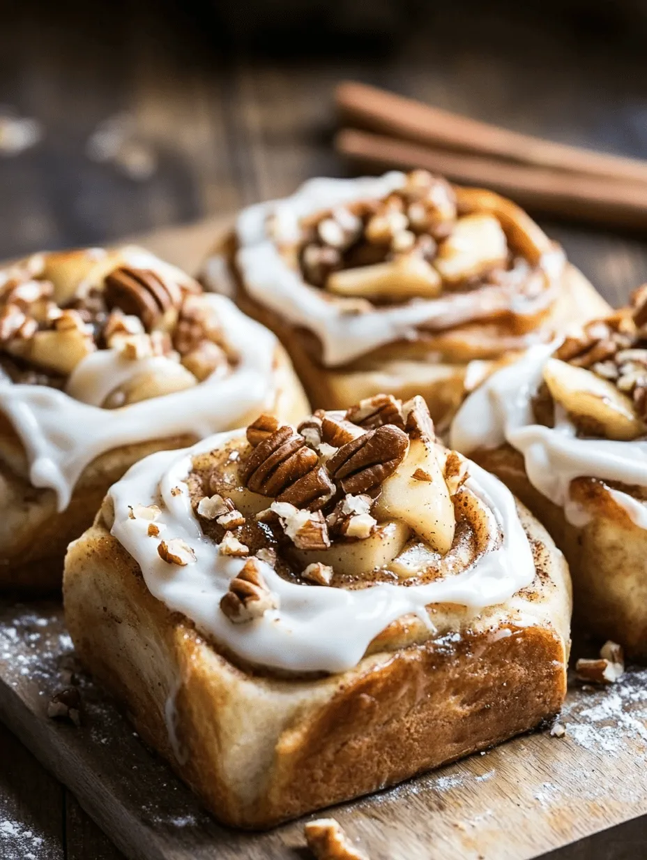 Cinnamon rolls have long held a special place in the hearts of home bakers and dessert lovers alike. Their delightful aroma wafting through the kitchen conjures memories of warm family gatherings, lazy Sunday mornings, and the comforting embrace of home. These sweet rolls are more than just a treat; they embody a sense of nostalgia, warmth, and indulgence. Today, we are excited to introduce you to a variation that elevates this classic to a whole new level: Irresistible Apple Cinnamon Rolls with Cream Cheese Frosting.