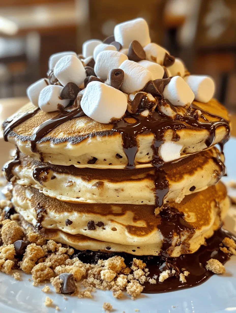When it comes to comfort food, S’mores hold a special place in our hearts, conjuring up memories of cozy campfires, laughter, and late-night snacks. The classic combination of graham crackers, gooey marshmallows, and rich chocolate creates an irresistible treat that evokes nostalgia and warmth. Now, imagine taking that beloved campfire delight and transforming it into a breakfast masterpiece. Welcome to the world of S’mores Pancakes—a delightful twist that merges the traditional flavors of S’mores with the beloved pancake breakfast staple.